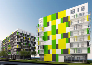 widok na dwa budynki na pierwszym planie kolorowa elewacja pomysłu architekta z Wrocławia